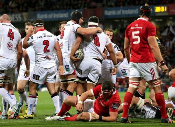 Ulster's Nick Williams celebrates with Franco van der Merwe after scoring their third try of the game. Photo: INPHO/Ryan Byrne