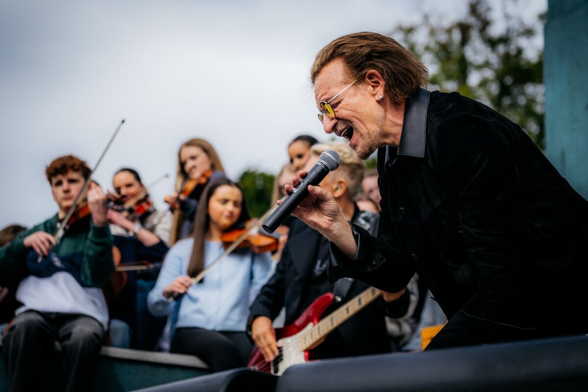 U2's Bono during a performance to 1000 students and staff from their old school at Mount Temple Comprehensive School in Dublin. Picture: Rich Fury/U2/LHP/PA Wire