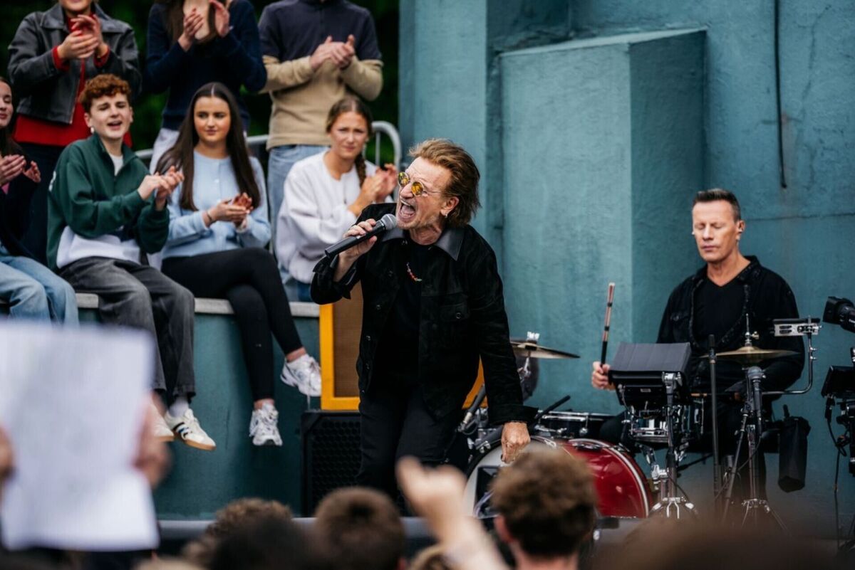 Bono and Larry Mullen Jr, during a performance to 1000 students and staff from their old school at Mount Temple Comprehensive School in Dublin. Picture: Rich Fury/U2/LHP/PA Wire