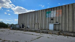 <p>A faded Irish tricolour remains on a building at the now-disused Camp Clarke near Lipjan, where former Defence Forces officer Colin Sheridan served with KFOR in 2004.</p> <p>A faded Irish tricolour remains on a building at the now-disused Camp Clarke near Lipjan, where former Defence Forces officer Colin Sheridan served with KFOR in 2004.</p>