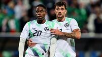 Troy Parrott and Chiedozie Ogbene react during the game 24/9/2026