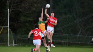 <p> Dromtariffe midfielder Adam Buckley claims possessionin the air in the Cork IAFC quarter-final against Dromtariffe. Pic: Larry Cummins</p> <p> Dromtariffe midfielder Adam Buckley claims possessionin the air in the Cork IAFC quarter-final against Dromtariffe. Pic: Larry Cummins</p>