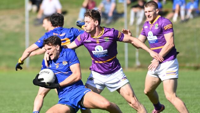 <p>St Finbarr's Brian Hayes is tackled by Carbery's Aaron Hayes during the McCarthy Insurance Group Premier SFC quarter final at Clonakilty. Pic: Eddie O'Hare</p>