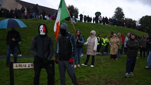 <p>Protesters gather on the Garvaghy Road, where members of the Orange Order were due to take part in the first return parade on the road for almost 30 years. Picture: Peter Morrison/PA Wire</p> <p>Protesters gather on the Garvaghy Road, where members of the Orange Order were due to take part in the first return parade on the road for almost 30 years. Picture: Peter Morrison/PA Wire</p>