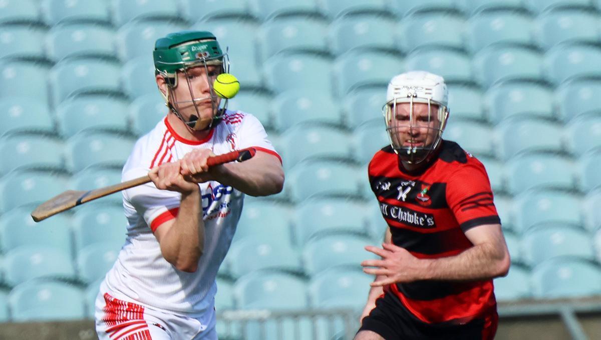 FIRM FOCUSL: Jack Ryan, Doon, clearing the Sliotar against Mark Connolly of Adare in the Limerick SHC quarter-final. Pic: Brendan Gleeson