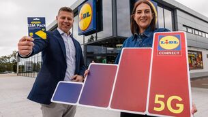 <p> Robert Ryan, CEO of Lidl Ireland with cookbook author and food content creator Gina Daly at the launch of Lidl Connect. Picture: Damien Eagers / Julien Behal Photography </p>