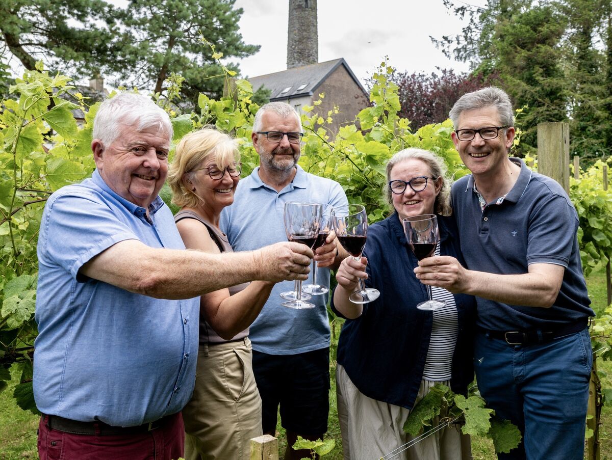 Ger Wall, Anne Wall, Aidan Wall, Aoife McCan and Colm McCan among the vines at “Martha’s Vineyard” in Cloyne, Co. Cork. The small family vineyard is named in honour of Ger and Aidan’s late mother, Martha. Picture: Chani Anderson Ger Wall, Anne Wall, Aidan Wall, Aoife McCan and Colm McCan among the vines at “Martha’s Vineyard” in Cloyne, Co. Cork. The small family vineyard is named in honour of Ger and Aidan’s late mother, Martha. Picture: Chani Anderson
