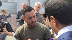 Patriot Platform founder Daniel Thomas, known as Danny Tommo speaking to Reform UK home affairs spokesman Zia Yusuf in Portsmouth following a protest (Pol Allingham/PA)