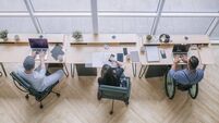 diversify Asian multi-ethic white collar worker busy working in office workstation in open plan