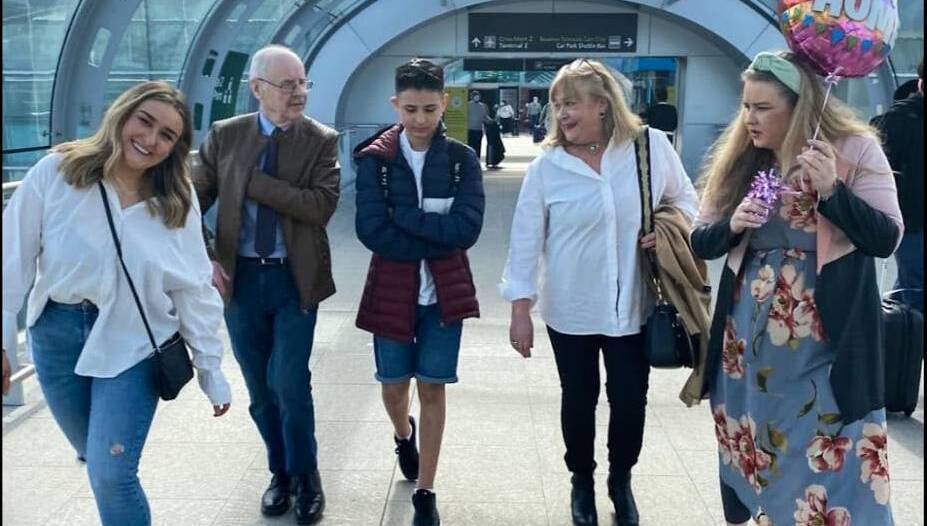 Fair Daniel Heeney after returning to Ireland alongside his aunt Kate, grandad Noel, grandmother Marian, and mother Noreen.