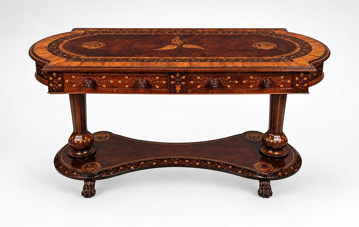 A 19th-century Killarney library table. A 19th-century Killarney library table.