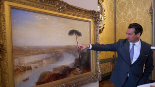 Julian Gascoigne examines the painting, JMW Turner’s 1836 “Rome, from Mount Aventine” (Domenico Stinellis/AP) Julian Gascoigne examines the painting, JMW Turner’s 1836 “Rome, from Mount Aventine” (Domenico Stinellis/AP)