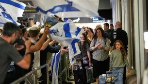 Israeli passengers who had been aboard are welcomed at the arrivals gate at Ben Gurion International Airport Israel (Ohad Zwigenberg/AP) Israeli passengers who had been aboard are welcomed at the arrivals gate at Ben Gurion International Airport Israel (Ohad Zwigenberg/AP)