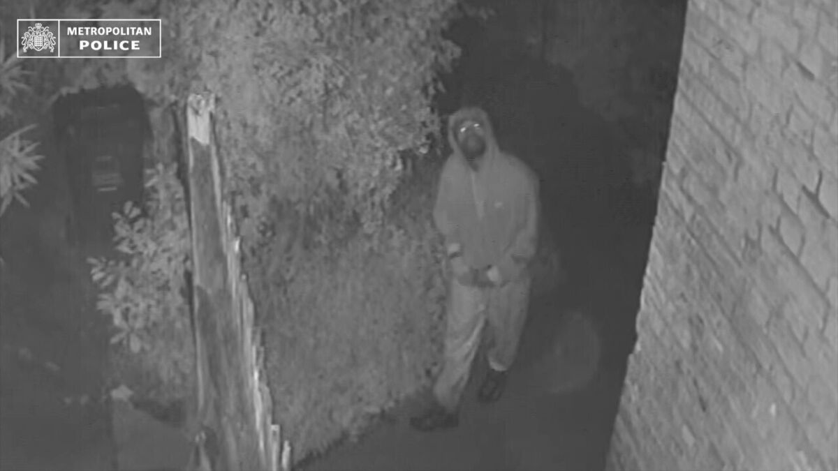 Ashley Malcolm outside the home of John Burke on the night of the burglary. Picture: Metropolitan Police/PA Wire Ashley Malcolm outside the home of John Burke on the night of the burglary. Picture: Metropolitan Police/PA Wire