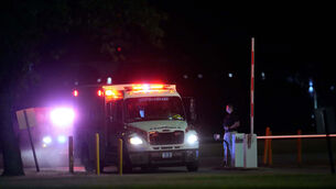 Emergency vehicles arrive at Riverbend Maximum Security Institution after the execution of Christa Pike was halted (George Walker/AP)