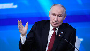 Russian President Vladimir Putin gestures while speaking at the session of the Valdai Discussion Club in Moscow (Pavel Bednyakov/AP) Russian President Vladimir Putin gestures while speaking at the session of the Valdai Discussion Club in Moscow (Pavel Bednyakov/AP)