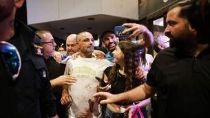 <p>Israeli passenger Yaniv Hayoun, with blood stains on his shirt, who was aboard the Flydubai aircraft. (AP Photo/Tomer Appelbaum)</p>