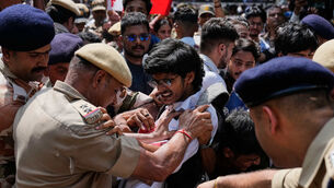 Police attempted to detain protesters (AP)