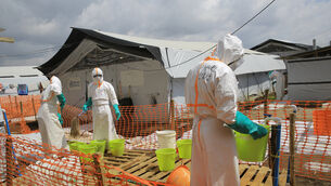 Health workers clean equipment inside an Ebola treatment camp (Sebastien Kitsa Musayi/AP) Health workers clean equipment inside an Ebola treatment camp (Sebastien Kitsa Musayi/AP)