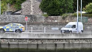 <p>Gardai investigating a road traffic collision on the Lower Glanmire Road, Cork City. Picture: Larry Cummins</p>