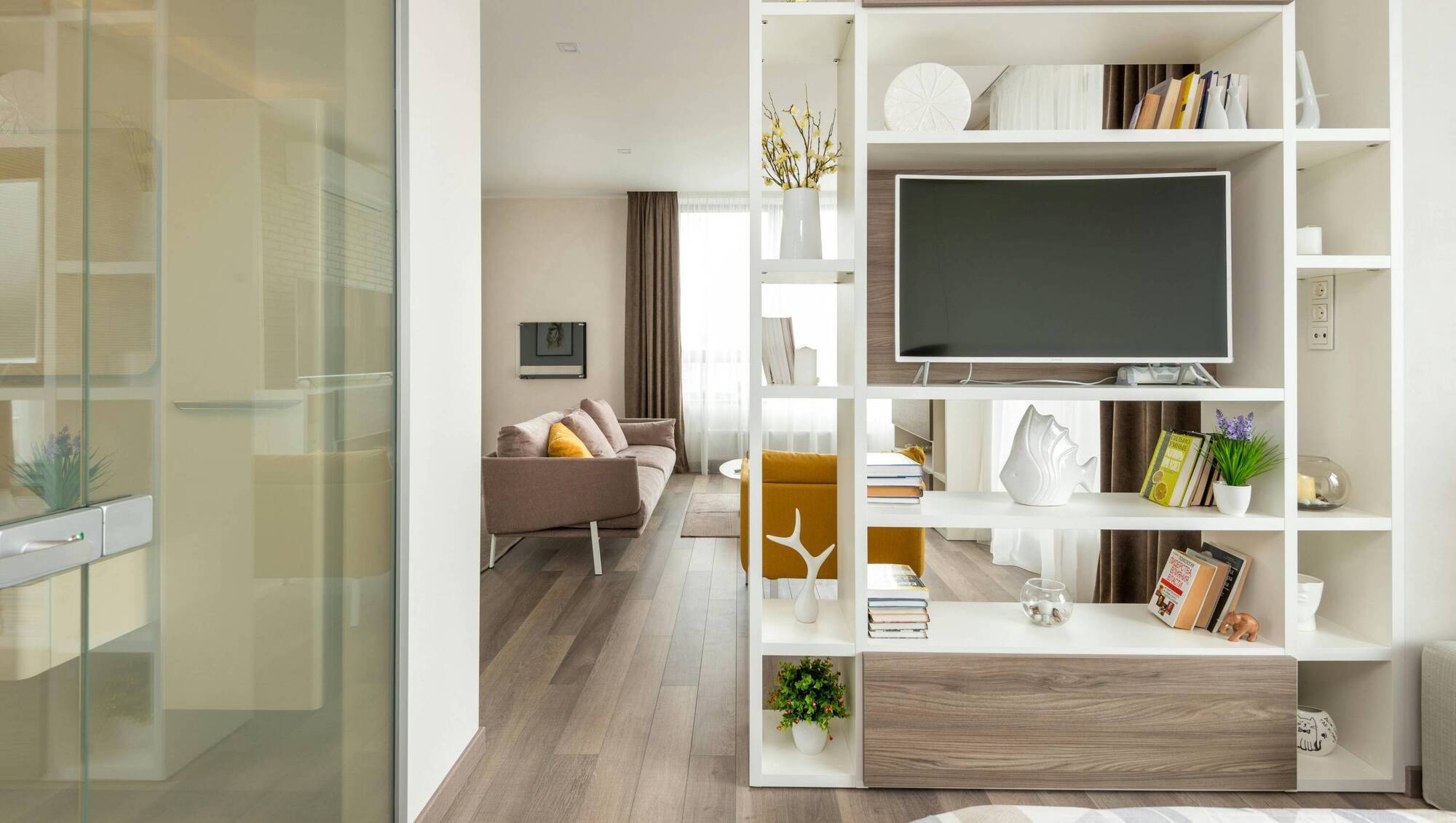 Use bookshelves to break up the space. Photo: Max Vakhtbovych 