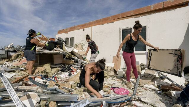 <p>People clean debris of a damaged house following a tornado in Pomas, southwestern France on August 25 that injured 39 people and damaged more than 300 homes.	<span class="contextmenu emphasis CaptionCredit">Picture: Idriss Bigou-Gilles / AFP via Getty</span>
            </p>