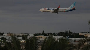 A FlyDubai aircraft carrying Israelis who experienced an emergency landing in Saudi Arabia arrives at Ben Gurion International Airport (Ariel Schalit/AP)
