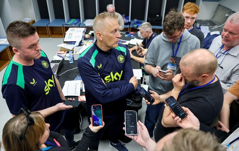 Hallgrímsson being interviewed in the dressing room after exiting the heated press conference. Pic: Ryan Byrne/Inpho