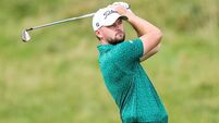 Liam Nolan watches his shot after playing from the fairway on the second 13/9/2026