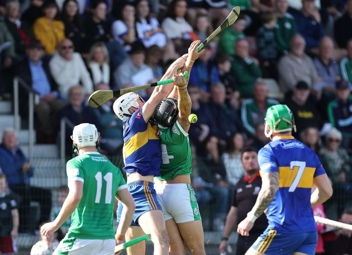 Griffin rises with James Dwyer of Ballincollig for the high ball. Pic: Jim Coughlan.