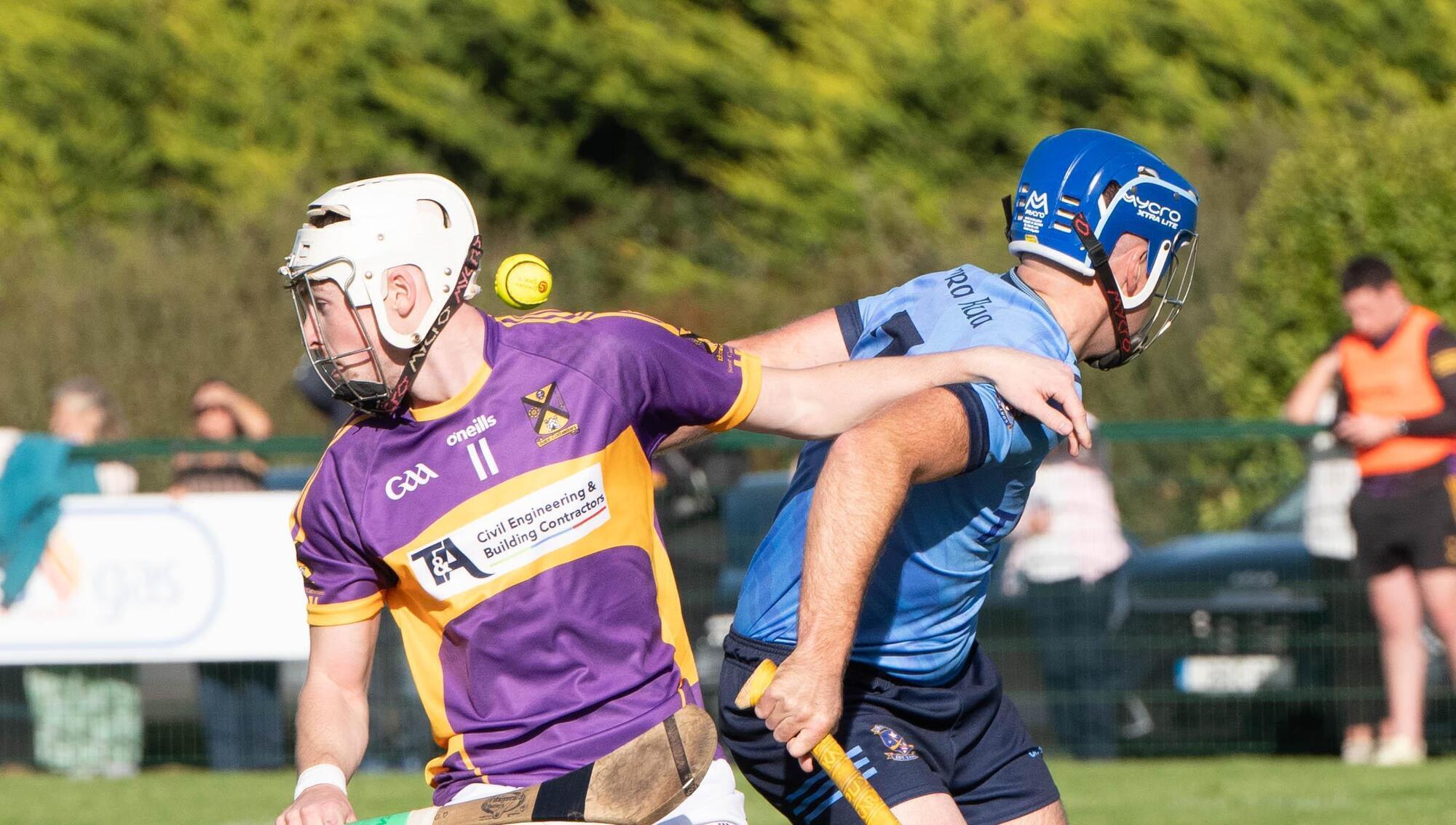 St Catherine' Sean O'Donoghue and Barryroe's Jerome O'Brien take their eyes off the sliotar during the PJHC semi final match in Ballymah. Pic: Howard Crowdy,