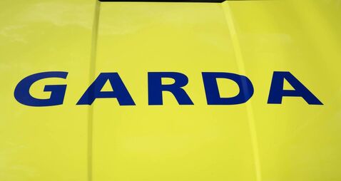 Garda sign on car hood