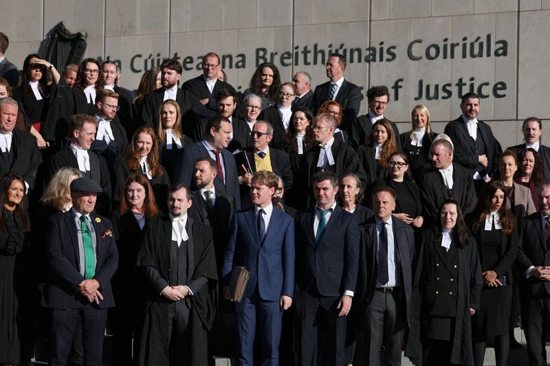 Around 200 criminal defence solicitors and barristers walked out of the Criminal Courts of Justice in Dublin on Monday to protest over a lack of action from Jim O’Callaghan to settle pay disputes. Picture: Clodagh Kilcoyne/PA Around 200 criminal defence solicitors and barristers walked out of the Criminal Courts of Justice in Dublin on Monday to protest over a lack of action from Jim O’Callaghan to settle pay disputes. Picture: Clodagh Kilcoyne/PA