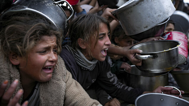 <p>Palestinian girls struggle for food at a distribution center in Khan Younis, Gaza. The bombardment and invasion are compounded by Israel’s blockade of hundreds of everyday essentials including medical kit in Gaza. 	<span class="contextmenu emphasis CaptionCredit">Picture: Abdel Kareem Hana/AP</span>
            </p>