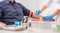 Professional doctor preparing patient for procedure