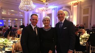 <p>HOSTESS: Noreen McManus pictured with Ryder Cup captains Luke Donald and Jim Furyk at the gala dinner at Adare Manor. Pic: Andrew Redington/Getty Images</p>