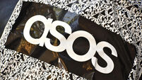 An Asos parcel waiting to be opened at home