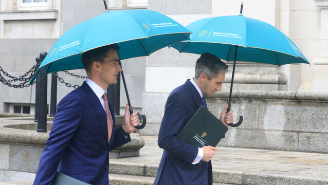 <p>Ministers Jack Chambers and Simon Harris arriving at the Dáil to present their Budget. Savings above €50,000 will be taxed at a rate of 1%. Photo: Leah Farrell/© RollingNews.ie</p>
