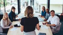 Businesswoman addressing a meeting in office