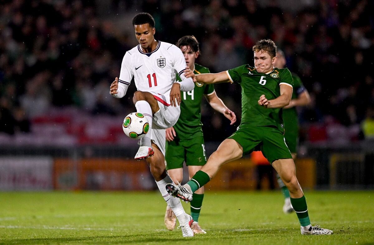 Divine Mukasa of England in action against Jacob Devaney of the Republic of Ireland. Pic: Ben McShane/Sportsfile Divine Mukasa of England in action against Jacob Devaney of the Republic of Ireland. Pic: Ben McShane/Sportsfile