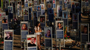 People mark the third anniversary of the October 7, 2023, Hamas attack (Ohad Zwigenberg/AP)