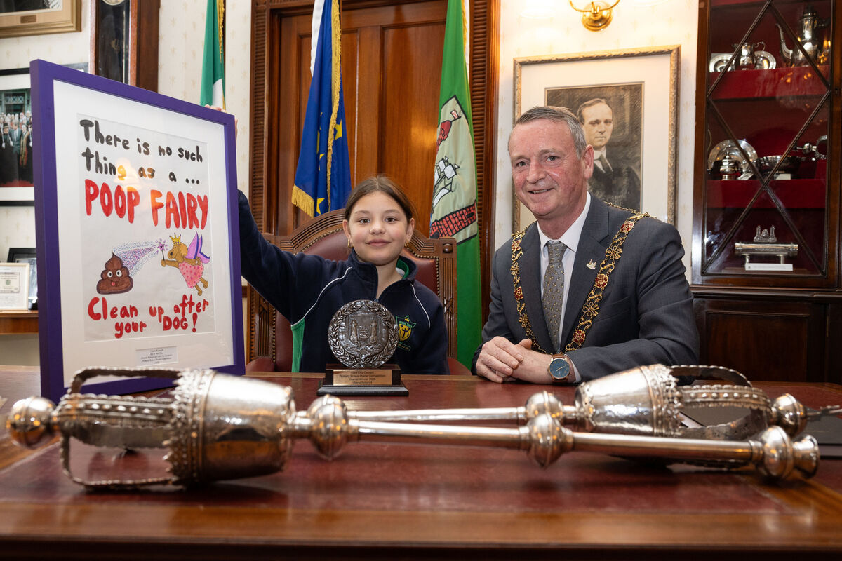 Overall winner of the anti-dog fouling schools poster competition Uliana Kolisnyk (left) with Lord Mayor Cllr Fergal Dennehy. Up to 1000 school kids amongst Cork City took part in the competition. Photo: Darragh Kane