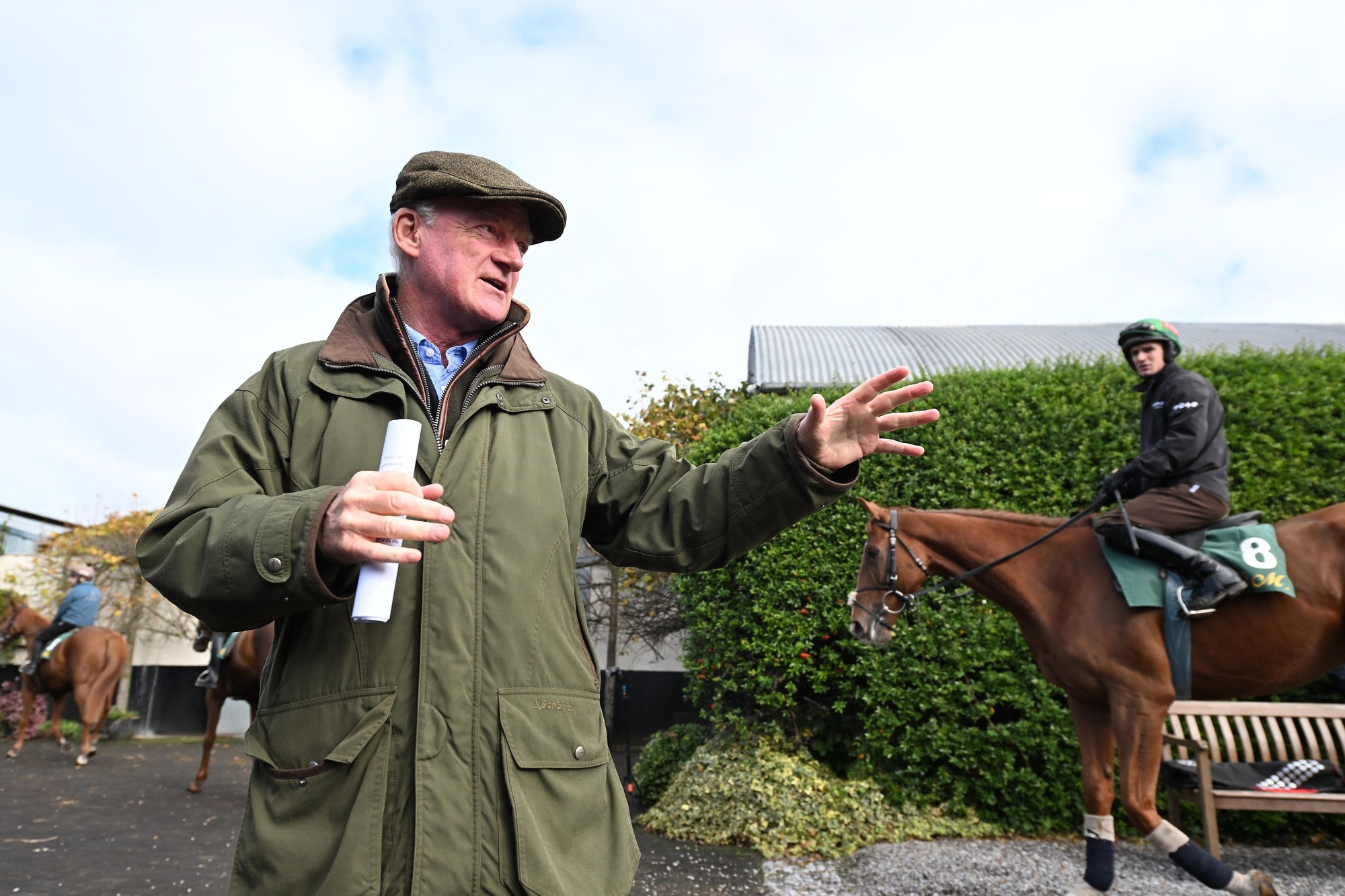 Trainer Willie Mullins points the way at his stables. Pic: Healy Racing