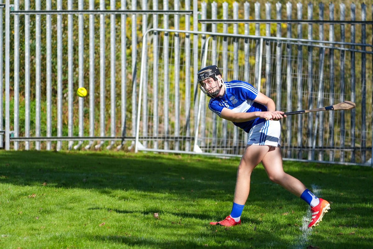 Gaelcholáiste Mhuire’s Mixie Gale takes a sideline cut. Picture by Noel Sweeney Gaelcholáiste Mhuire’s Mixie Gale takes a sideline cut. Picture by Noel Sweeney