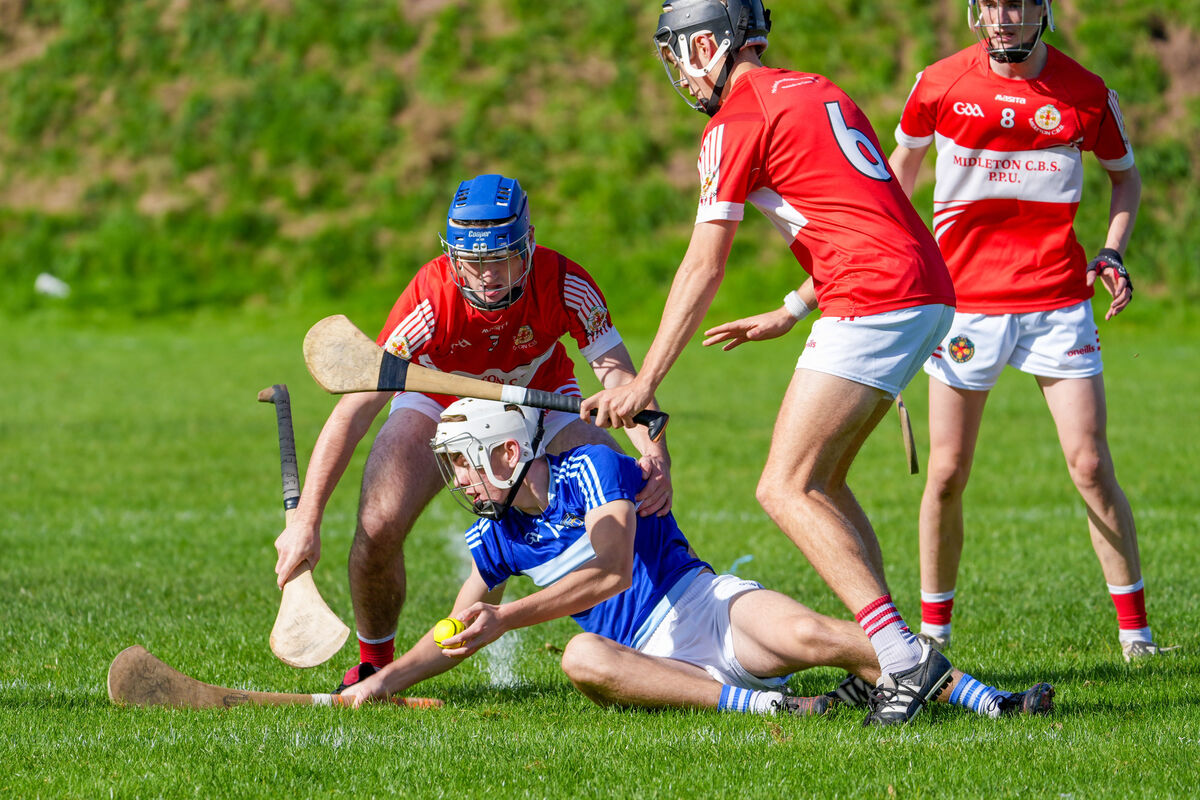 Gaelcholáiste Mhuire’s Darragh Coade holds the ball after a foul. Picture by Noel Sweeney Gaelcholáiste Mhuire’s Darragh Coade holds the ball after a foul. Picture by Noel Sweeney