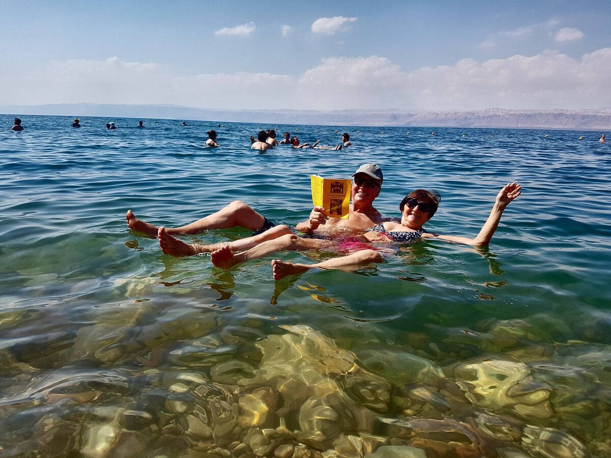 Michael Berry with his wife Wendy floating in the Dead Sea in Jordan 