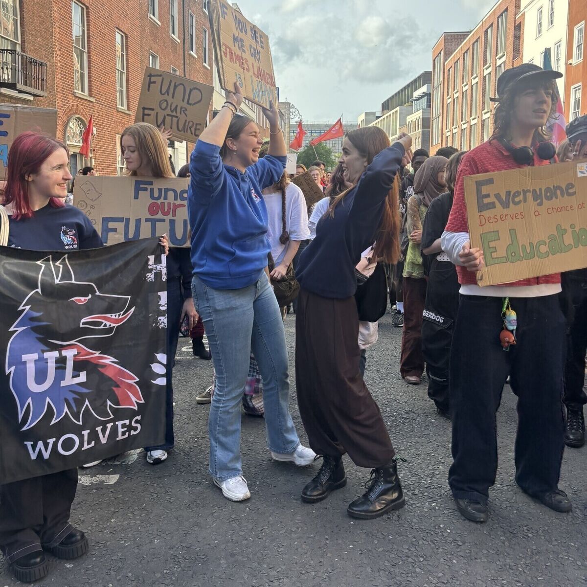 University of Limerick graduate Eva McCormack (centre right) at the Budget Day protest in Dublin. She said the Government's failure to abolish the student contribution fee will be 'devastating' on families. Photo: Cate McCurry/PA University of Limerick graduate Eva McCormack (centre right) at the Budget Day protest in Dublin. She said the Government's failure to abolish the student contribution fee will be 'devastating' on families. Photo: Cate McCurry/PA