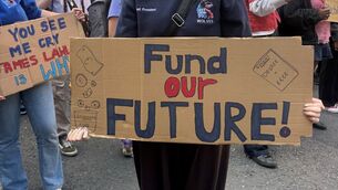 <p>Students protesting outside Leinster House on Budget Day. Photo: Cate McCurry/PA</p> <p>Students protesting outside Leinster House on Budget Day. Photo: Cate McCurry/PA</p>