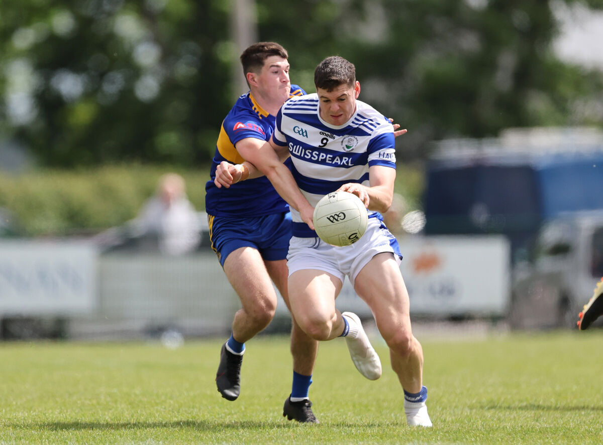  Kieran McCarthy, Carrigaline, tackling Rory Maguire, Castlehaven. Picture: Jim Coughlan.