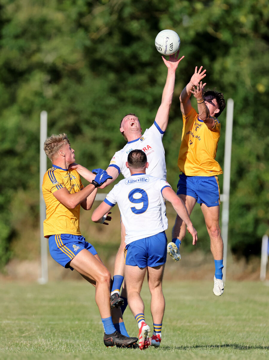 ON THE RISE: Thomas Egan and John Wiggington Barrett, St Finbarr's, rise high with Patrick Mellett and Jack McCarthy, Carrigaline, in the opening round in July at Ballinhassig. Picture: Jim Coughlan.